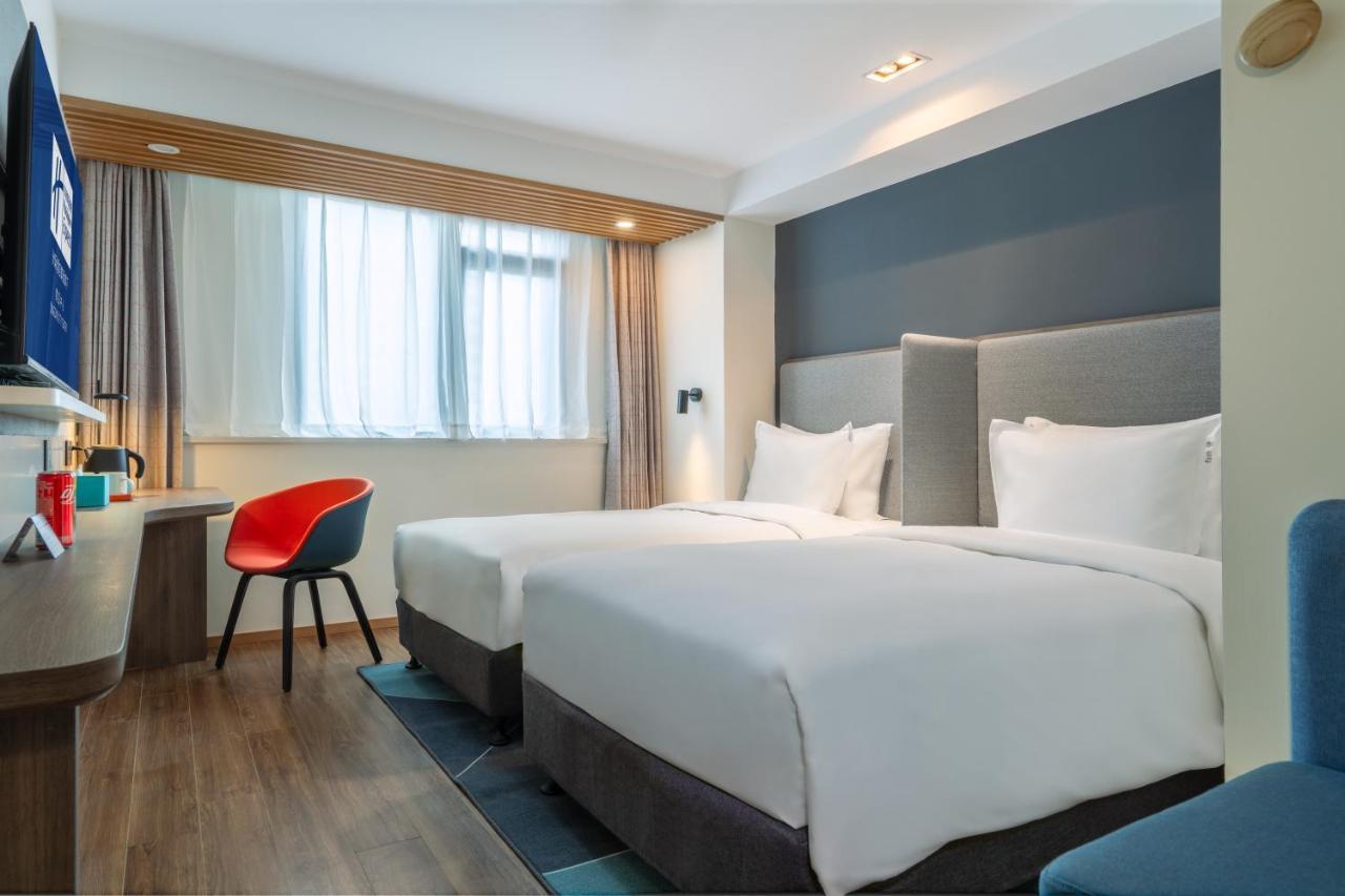 Holiday Inn Express Qingdao City Center By Ihg Bagian luar foto