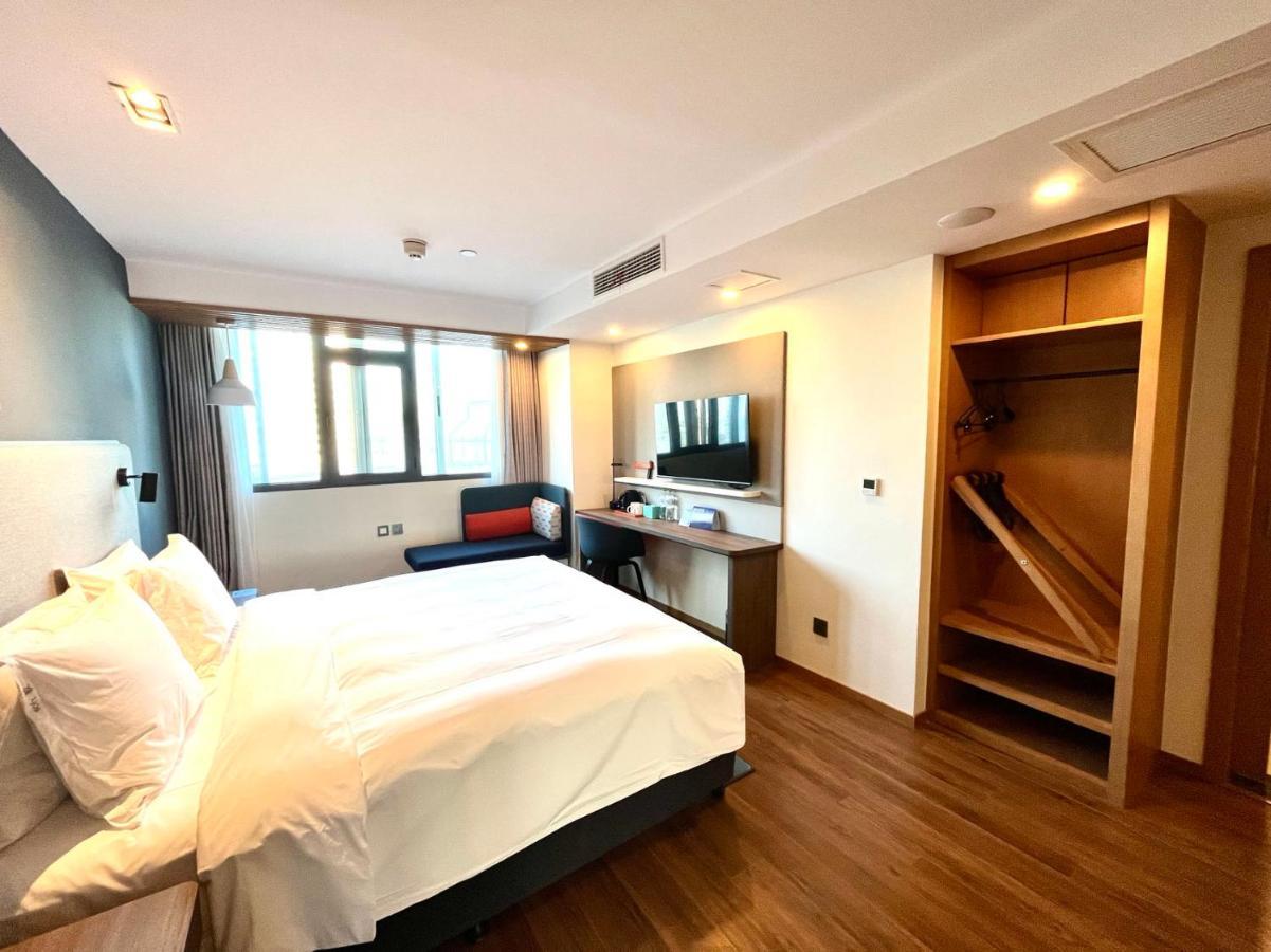 Holiday Inn Express Qingdao City Center By Ihg Bagian luar foto