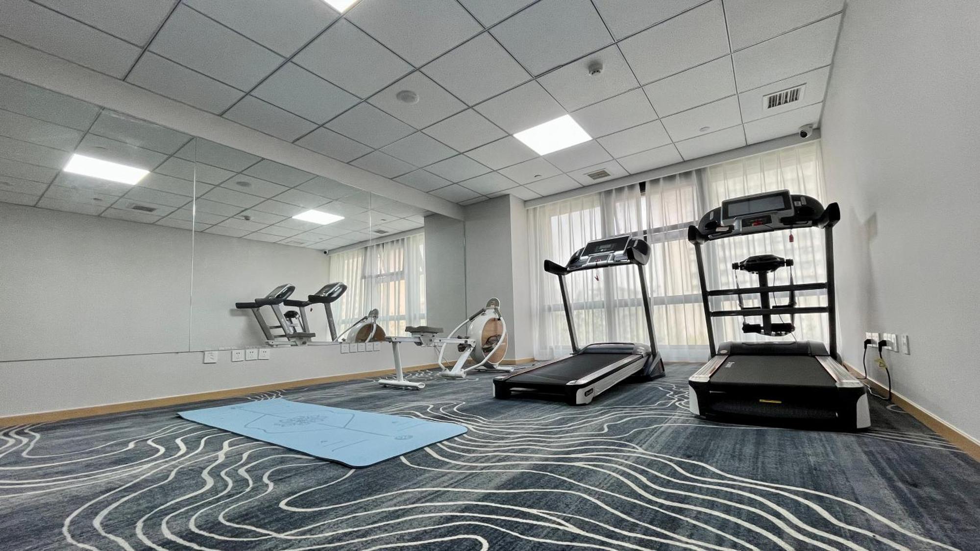 Holiday Inn Express Qingdao City Center By Ihg Bagian luar foto