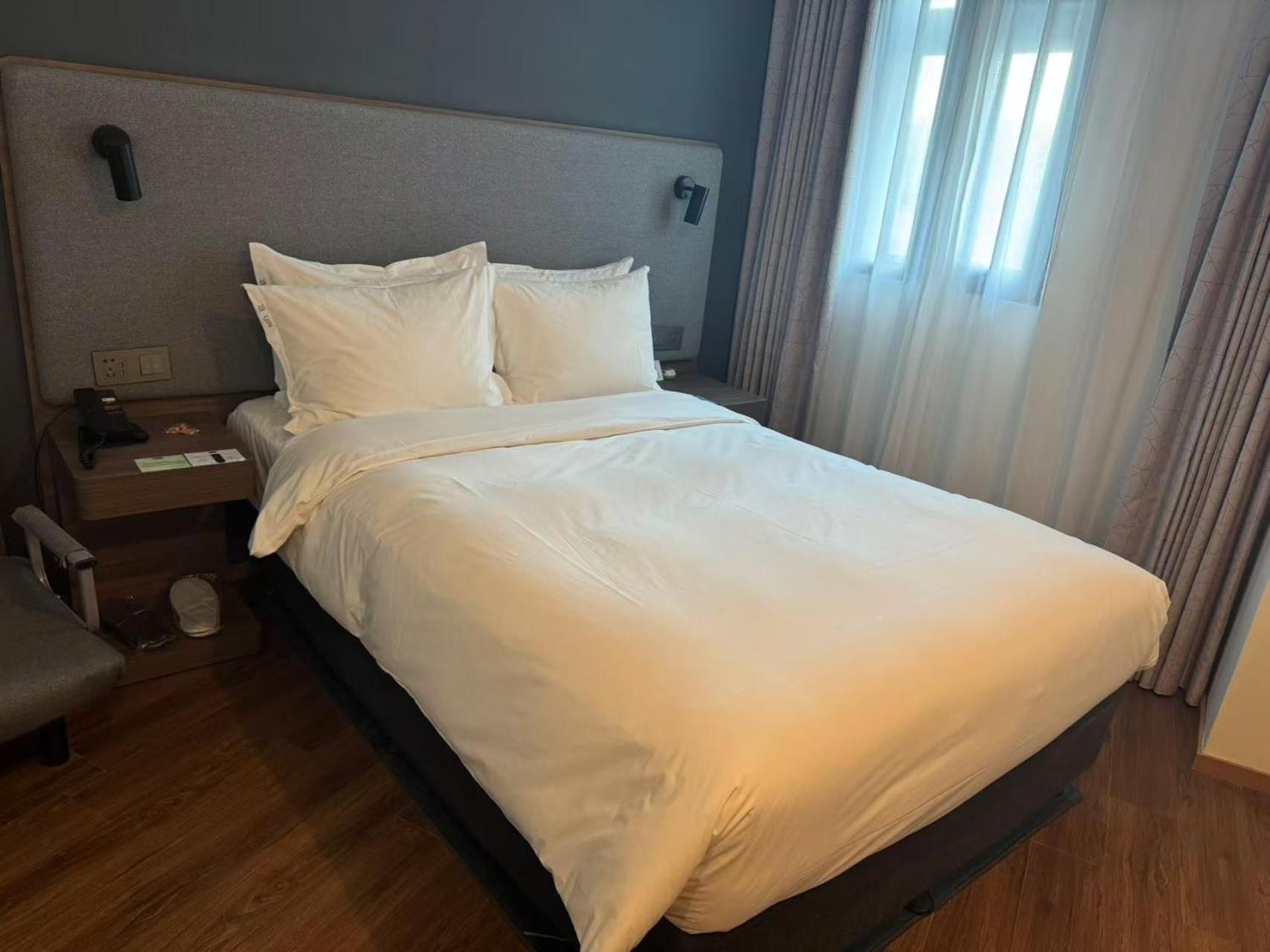 Holiday Inn Express Qingdao City Center By Ihg Bagian luar foto